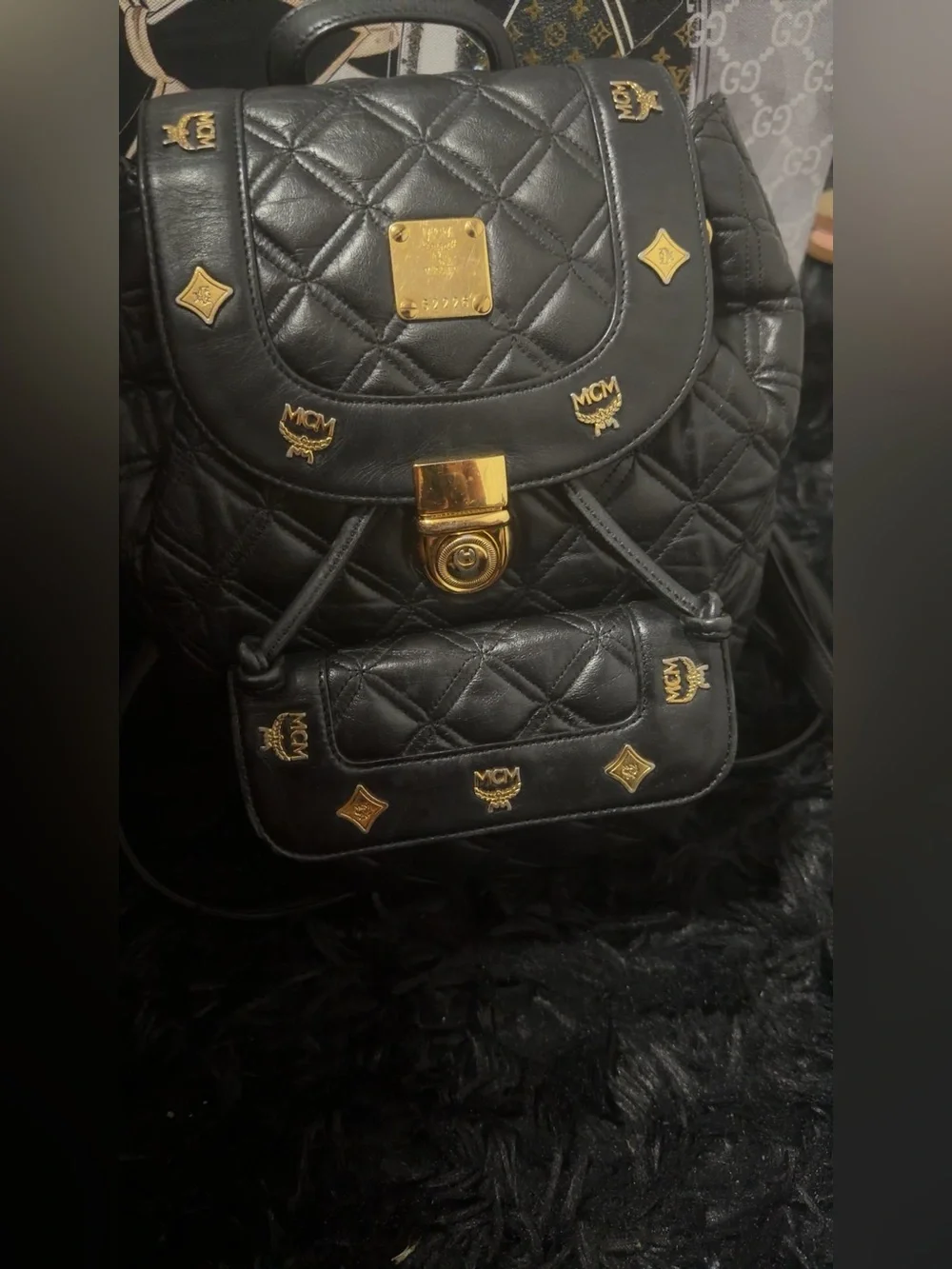 MCM Black Quilted Leather Backpack with Gold Hardware Accents